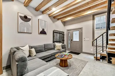 a living room with a couch and a table at Designer 5Bed - 4Bath Home in Old City A Plus Location in Philadelphia