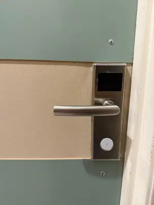 ajar door with a metal handle on a door at Hudson Yard 4 in New York