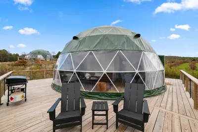 a gazebo on the deck of a house at Catskills Glamping at 'The Deer Dome' in Franklin in Franklin