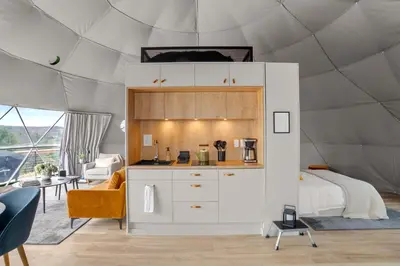 a bedroom in a dome tent with a bed at Catskills Glamping at 'The Deer Dome' in Franklin in Franklin