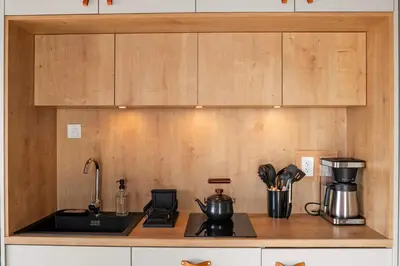 a kitchen with a sink and a counter top at Glamping Getaway at 'The Coyote Dome' in Franklin in Franklin