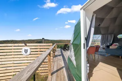 a view from the deck of a tiny house at 'The Bear Dome' with Barrel Hot Tub in Franklin in Franklin