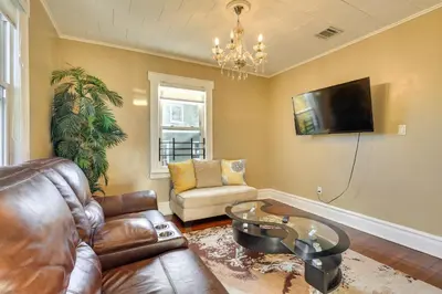 a living room with a couch and a table at Free Parking Spot! Extended Stay Near Newark and NYC in Irvington