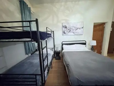 a bedroom with two bunk beds in a room at The Marlow Midtown in New York
