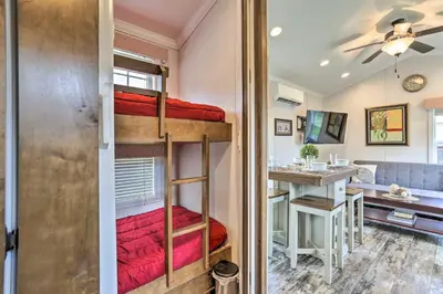 a room with bunk beds in a tiny house at Log Cabin And Cottages At Equestrian House in Pleasant Mount