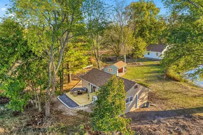 an overhead view of a small house in the woods at Pond Haven Retreat Wood-Burning HotTub & FirePit in Mount Bethel