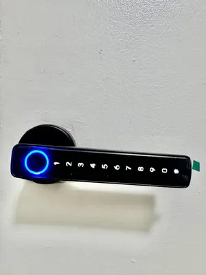 a blue light attached to a wall at A private master room in modern complex shared apartment in Lawrenceville