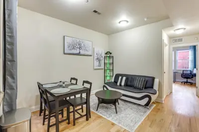a living room with a couch and a table at Spectacular 5BAand2BA Group Getaway in Philly! in Philadelphia