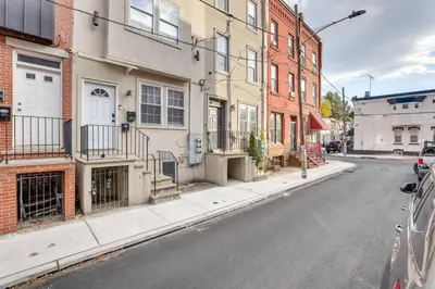 an empty street in a city with buildings at Spectacular 5BAand2BA Group Getaway in Philly! in Philadelphia