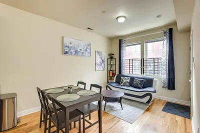 a living room with a table and chairs and a couch at Spacious 4BRand2BA Family Retreat in Philadelphia in Philadelphia