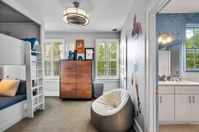 a room with a bed and a bean bag chair at Luxury Princeton Estate Pool, Hot Tub, Sleeps 20 in Princeton