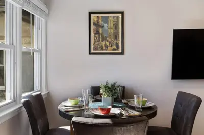 a dining room with a table and chairs at 3BR Home 2 Baths Bonus Room, Minutes to NYC in Hackensack