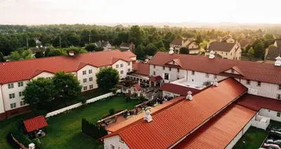 an overhead view of a village with white buildings at Normandy Farm Hotel & Conference Center in Blue Bell