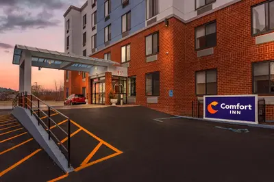 a building with a confident inn sign in front of it at Comfort Inn in Staten Island