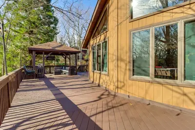 a deck with a gazebo on the side of a house at 5 Mi to Jack Frost Skiing Walkable Family Home in Lake Harmony