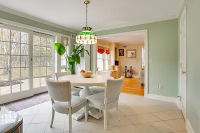 a dining room with a table and chairs at Pond and Gazebo Expansive Hudson Valley Escape! in Goshen