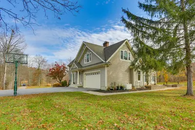 a house on a street with a tree at Pond and Gazebo Expansive Hudson Valley Escape! in Goshen