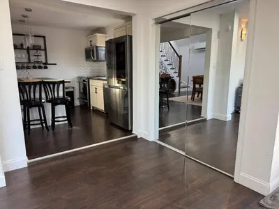 a kitchen and dining room with a sliding glass door at Mountain View family escape in Albrightsville