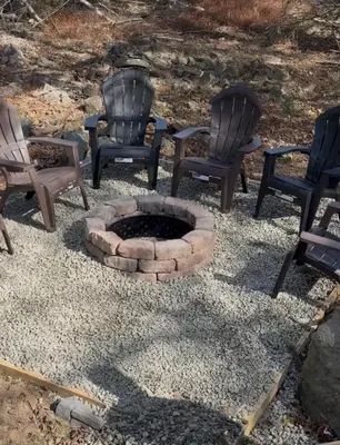three chairs and a fire pit in a yard at Boulders Retreat Hot Tub Sauna Game Room Fire Pit in Tobyhanna