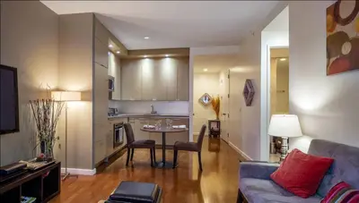 a living room with a couch and a table at 1600 Broadway in New York