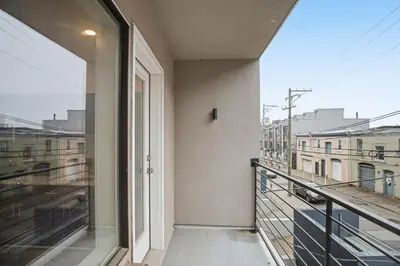 a balcony with a view of a city at Bright 1BR unit in the Fairmount Square building in Philadelphia