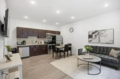 a living room with a couch and a table at Attractive 1BR1BA apartment at Fairmount Square in Philadelphia