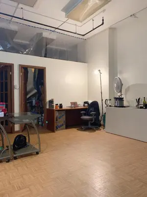 an office with a desk and a chair in a room at Near Seaport In Chinatown in New York