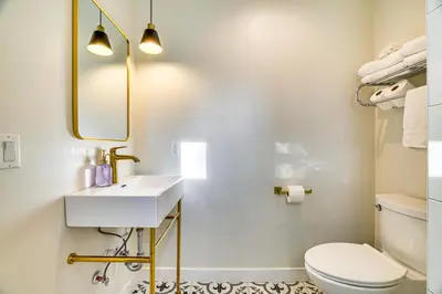 a bathroom with a sink and a toilet at Pet-Friendly Group Getaway 12 Mi to Camelback Mtn! in Cresco