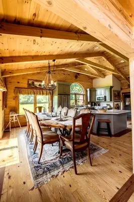 a dining room with a table and chairs in a kitchen at Luxurious Log Cabin with Game Room & Fireplace near Princeton in New Hope, Pennsylvania in New Hope