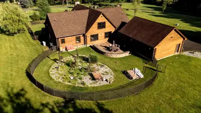 an aerial view of a house with a garden in the yard at Luxurious Log Cabin with Game Room & Fireplace near Princeton in New Hope, Pennsylvania in New Hope