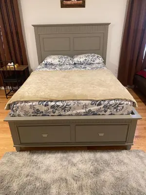 a bed in a bedroom with a bed frame at 730 Seaport Drive in Elizabeth
