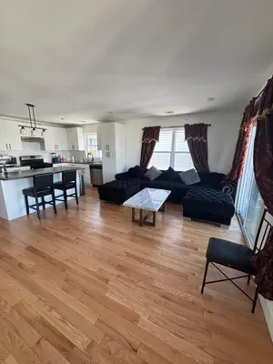 a living room with a couch and a table at 730 Seaport Drive in Elizabeth