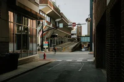 an empty city street with a red fire hydrant at The Citizen Suite - Downtown in Lancaster
