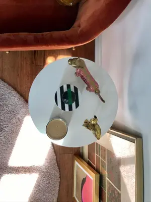 a white plate with some items on a wall at Cosy apartment in prime West Village in New York