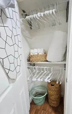 a walk in closet with baskets and pillows at Sunny Oak Lane Studio Near Einstein, LaSalle, Center City in Philadelphia