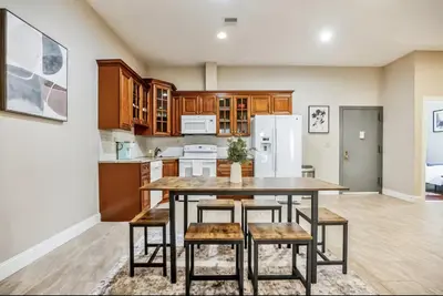 a kitchen with a table and chairs in a room at Luxury 3 Bedroom - Perfect Center City Location in Philadelphia
