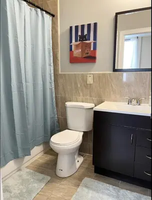 a bathroom with a toilet and a sink at Luxury 3 Bedroom - Perfect Center City Location in Philadelphia