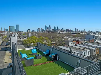a view of a city skyline from a building at Skyline Escape in Philadelphia Chic & Bright in Philadelphia