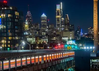 a view of a city at night with at Stay Like A Boss- Penthouse-Views- Convention Center- Free Parking in Philadelphia