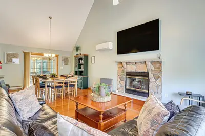 a living room with a couch and a fireplace at Game Room Retreat 5 Mi to Big Boulder Mtn in Blakeslee