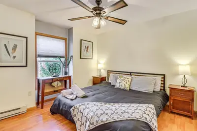 a bedroom with a bed and a ceiling fan at Game Room Retreat 5 Mi to Big Boulder Mtn in Blakeslee