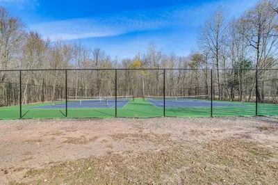 a tennis court with two tennis courts at Game Room Retreat 5 Mi to Big Boulder Mtn in Blakeslee