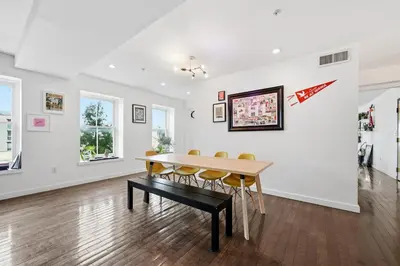 a dining room with a table and chairs at Beautiful 4th Floor Walk-Up Apartment in Old City in Philadelphia