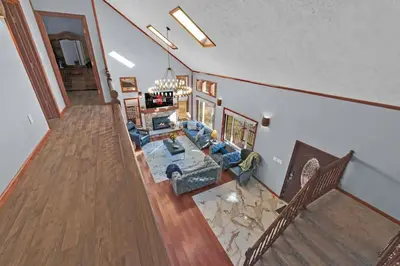 an overhead view of a living room with a couch at Big Bass Hideaway with Hot Tub in Gouldsboro