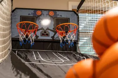 a basketball hoop with two orange baskets on it at 4BDRM Games Family Frndly Fire Pit Masthope in Lackawaxen