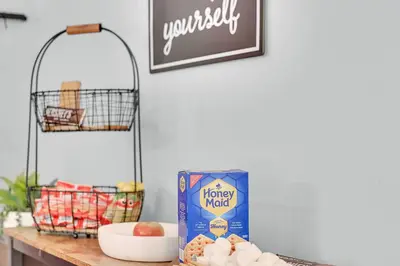 a counter with a box of honey mend cereal and a bowl of food at Hot Tub Game Room Firepit Arrowhead Family in Thornhurst