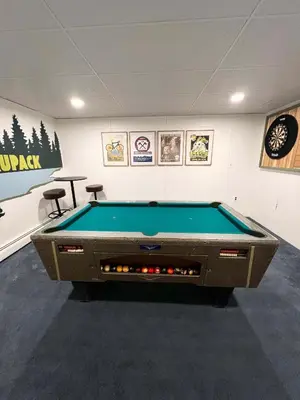 a billiard room with a pool table in it at Charming Getaway Minutes from Lake Wallenpaupack in Tafton