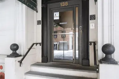 a door on the side of a building at Blueground Murray Hill view nr Empire State NYC-1911 in New York
