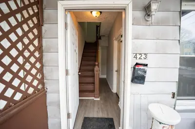 a hallway of a tiny house with a staircase at Casa Ebenecer - Habitación privada # 3 in Elizabeth