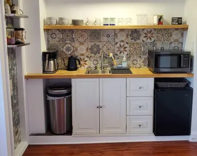 a kitchen with a sink and a microwave at Waterfront Getaway in Historic Bristol in Bristol